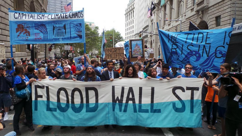 Thousands Flood Wall Street With Mass Sit-In for Climate Justice