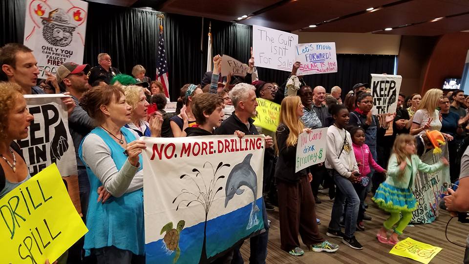 Defenders of Land, Water and Climate Take Over Federal Oil Lease Sale at the New Orleans Superdome. Photo by Indigenous Environmental Network